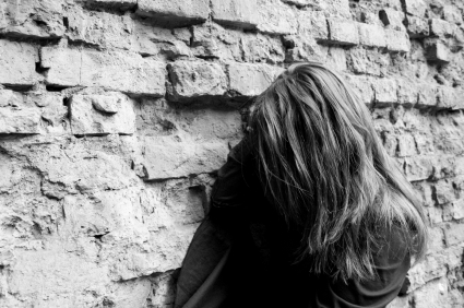 Girl against wall iStock_000001611025XSmall